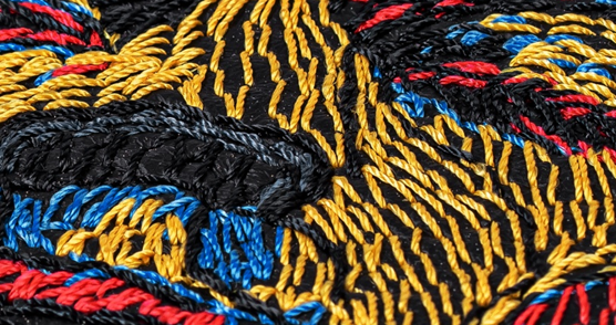 Portrait of Jimi Hendrix created with thick Serafil thread, each stitch manually placed to build texture and depth 